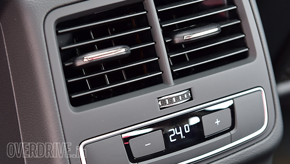 It features a three-zone climate control system