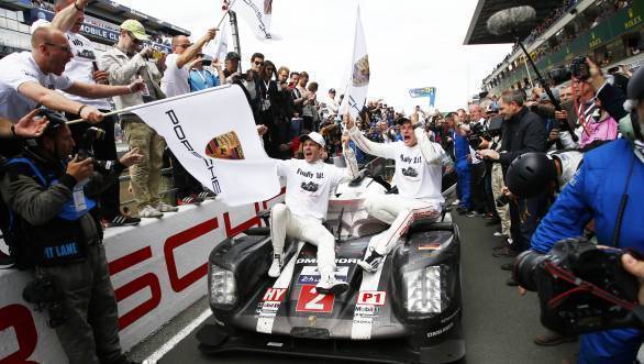Romain Dumas, Marc Lieb and Neel Jani celebrate their victory at Le Mans