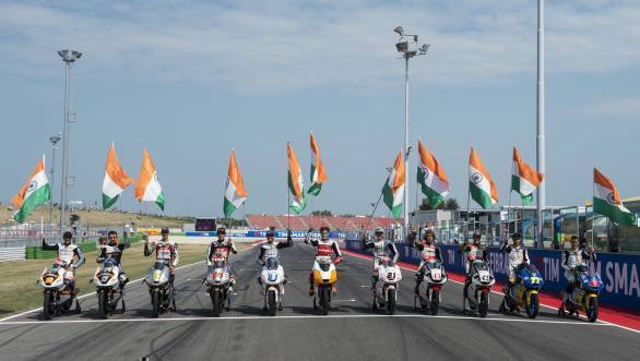 Mahindra Racing riders celebrate the company's 100GP starts at Misano this weekend