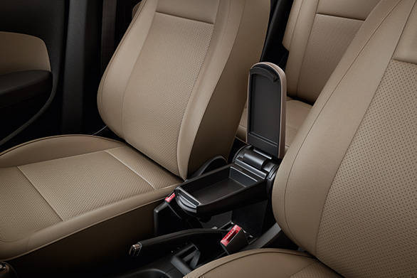 The arm rest is adjustable and is carried over from the outgoing car