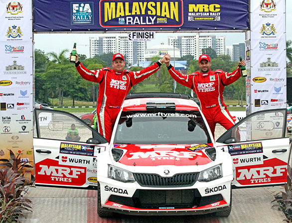 2016 Asia Pacific Rally Champions - Gaurav Gill and Glenn Macneall celebrate their win at Johor Bahru