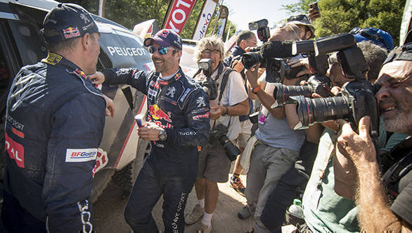 Sebastien Loeb and Stephane Peterhansel  of Team Peugeot TOTAL seen surrounded by media after stage 11 of Rally Dakar 2017 from San Juan to Rio Cuarto, Argentina on January 13, 2017. // Marc Bow/Red Bull Content Pool // P-20170113-01724 // Usage for editorial use only // Please go to www.redbullcontentpool.com for further information. //