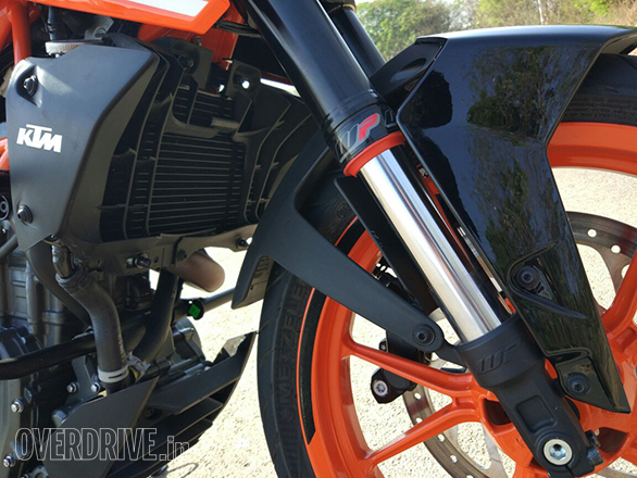 The new open cartridge 43mm upside down forks on the 2017 KTM 390 Duke have 8mm less travel than before but they're vastly more sophisticated in feel and offer remarkably improved levels of control over the chassis at high speeds as well as over rough roads