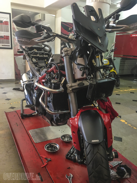 Stripped of its considerable bodywork, the Multistrada is a tall and skinny motorcycle. Almost a full transformer. But all that plastic also means working on it requires lots of screws to fiddle with