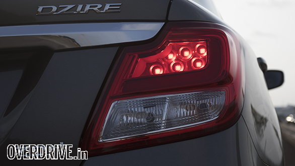The circular detailing within the Maruti Suzuki Dzire's taillight is a smart and premium touch