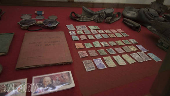 These are the stamps used at that time, as well as the pay book and glasses