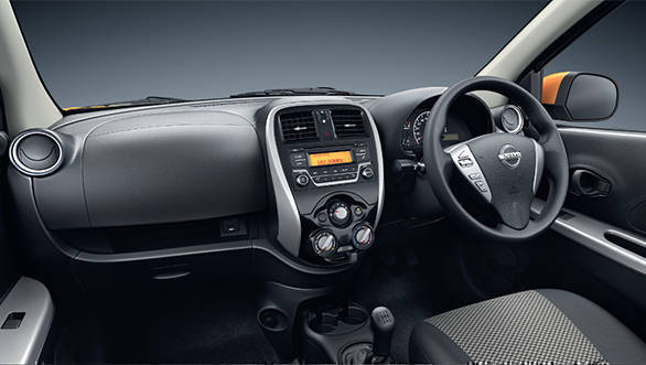 The dashboard sports an all-black finish to make it look upmarket and premium
