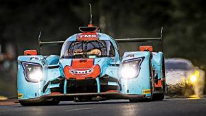 Two Gulf-liveried cars cross the finish line at 2017 24 Hours of Le Mans