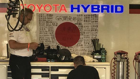 This could be the year that Toyota finally wins Le Mans. But it isn't over till it's over. Words of encouragement, perhaps, on the Japanese flag in the garage