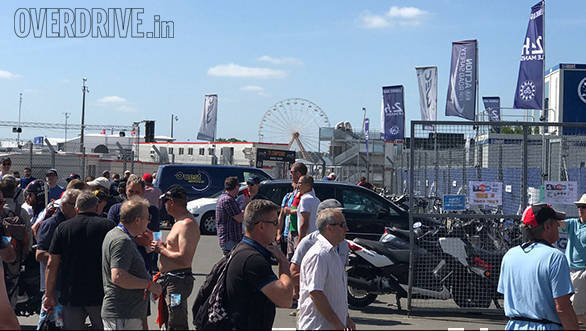 It's a warm Le Mans this year. Apparently warmest since 2005! Also likely to be the first dry Le Mans since 2000. Beyond the people sunning themselves, you can see the Ferris wheel that overlooks Ford chicane