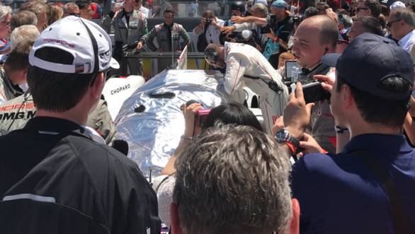 Aside from the fact that the crowd was impossible to get through, note the reflective cover to help keep the heat at bay. Never seen this used at Le Mans before, but of course, this is the hottest Le Mans since 2005