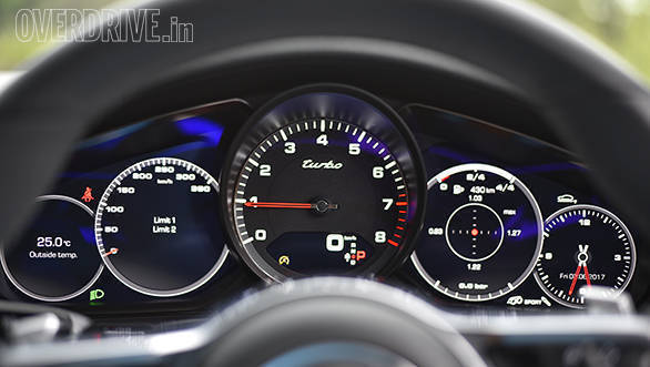 The 2017 Porsche Panamera Turbo's instrument is designed in typical Porsche fashion with the analogue tachometer in the centre. It's got 7-inch displays on either side, which can show a lot of data. In this image, the display is set to show a G-Force meter