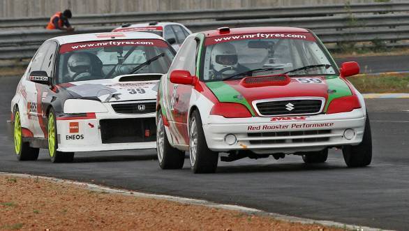 The battle for the lead in Race 1 of the ITC, with Ramaswamy's Red Rooster Racing car leading the pack