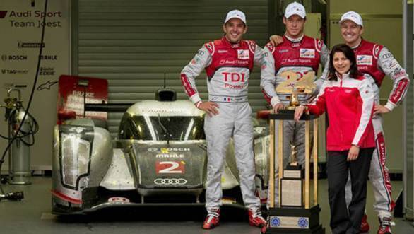 Ace race engineer Leena Gade and drivers Benoit Treluyer, Andre Lotterer and Marcel Fassler with their trophy after winning the 24 Hours of Le Mans